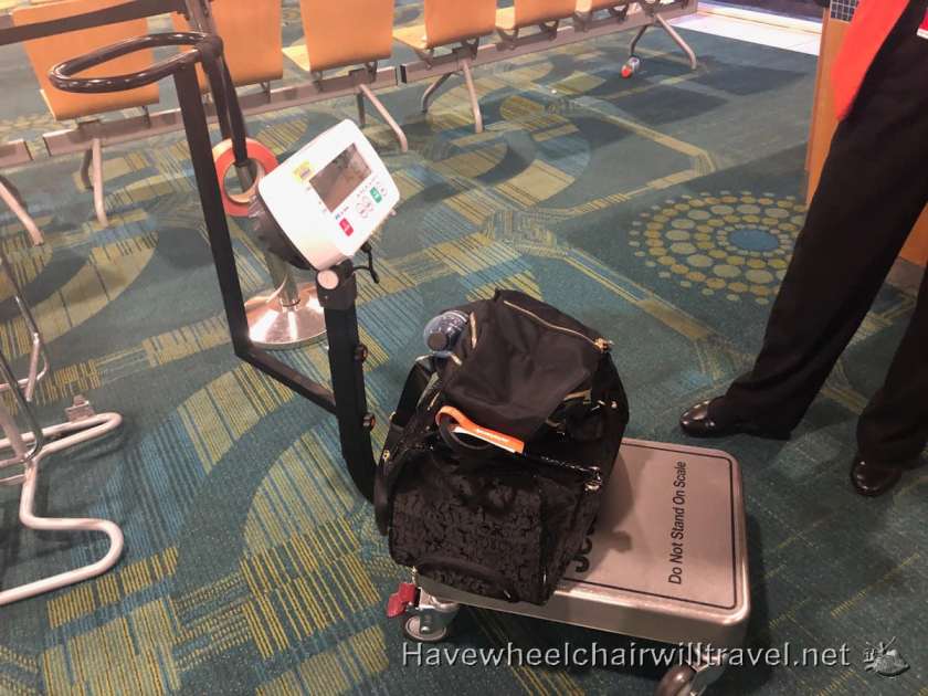 Jetstar budget airline review - weighing luggage - Have Wheelchair Will Travel